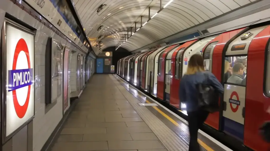 London underground Piccadilly line at night service is arriving to station